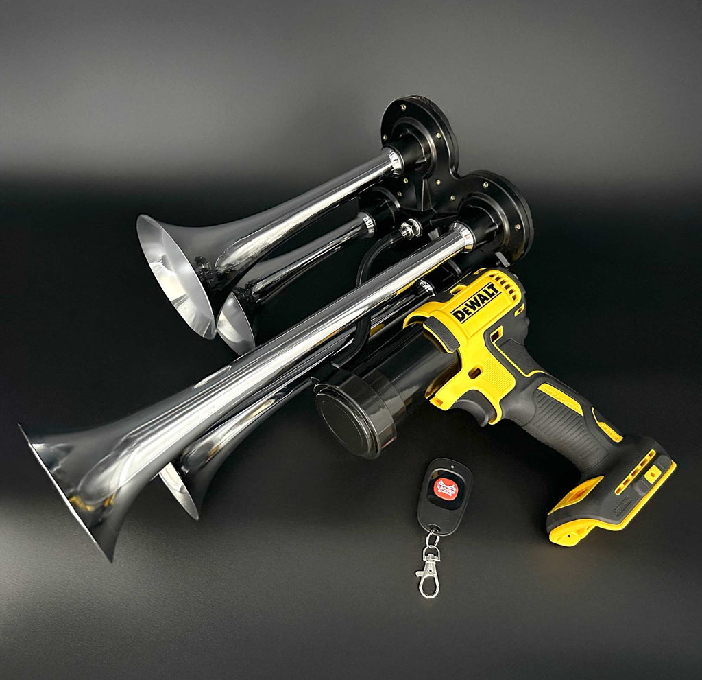 DeWalt Train Horn with chrome trumpets and remote control laying 