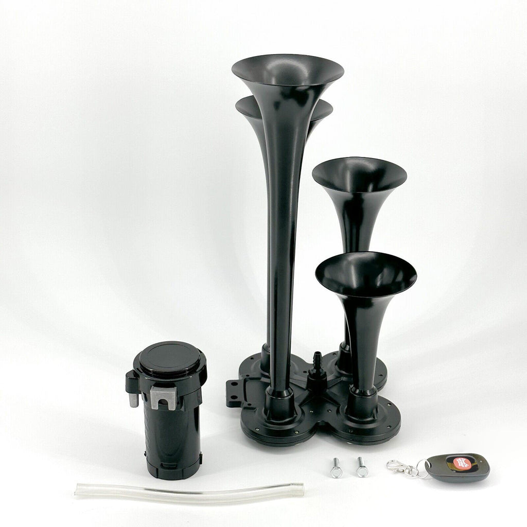 DIY train horn kit with four black trumpets, compressor canister, wireless remote, mounting bolts, and air hose arranged on a white background