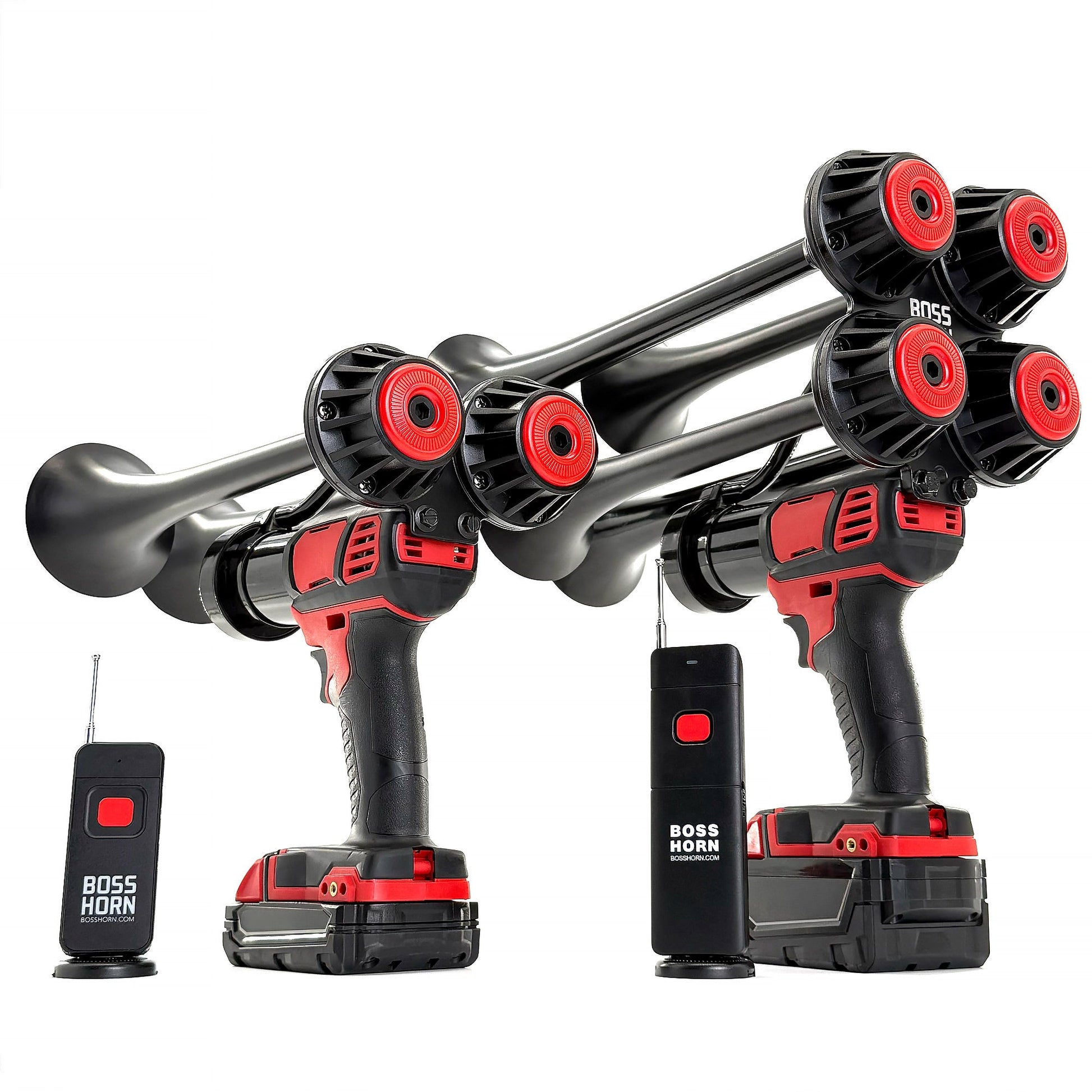 Two black and red dual-trumpet train horn units on cordless power tools with Milwaukee® M18 batteries and two wireless remotes on white