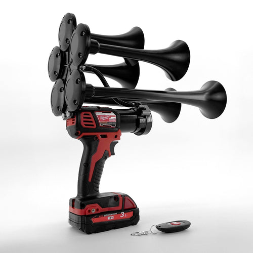 Black and red air horn with battery pack and remote control on a white background