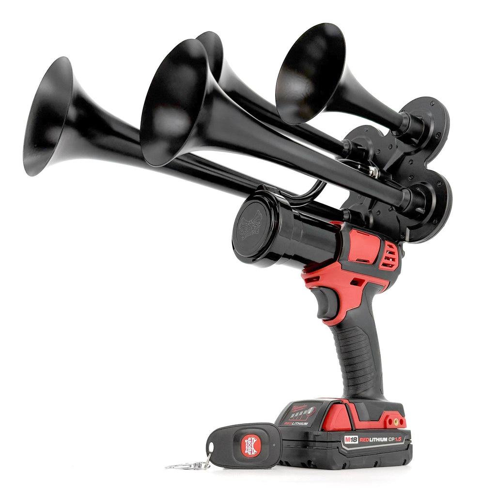 Black 4-trumpet train horn mounted on a cordless power tool with Milwaukee® M18 battery and small remote fob